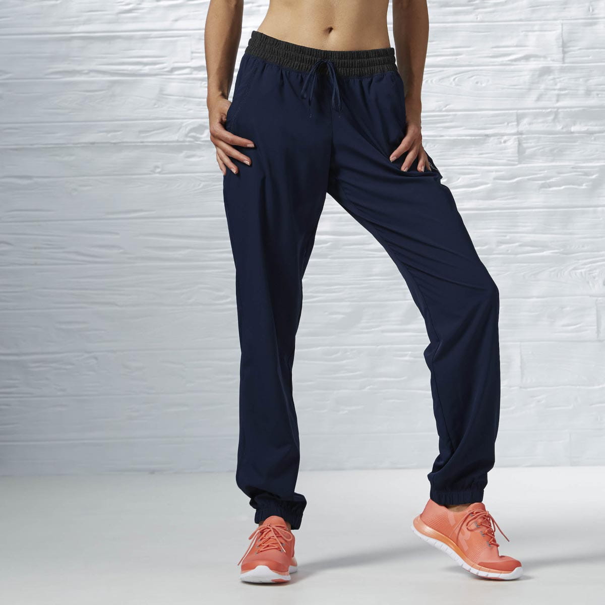 Dámské fitness kalhoty Reebok Sport Essentials Pant Woven Pant